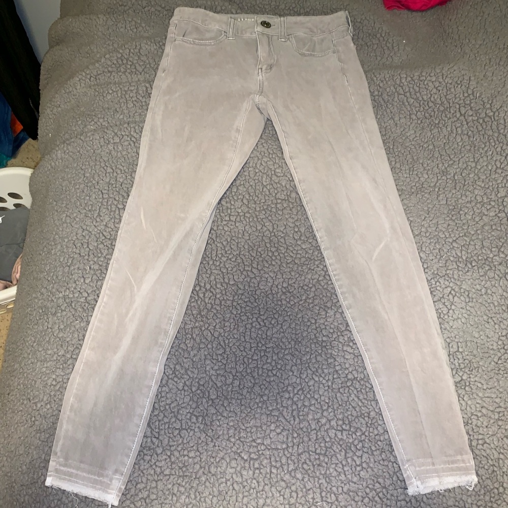 Grey/ Tan American Eagle Jeans